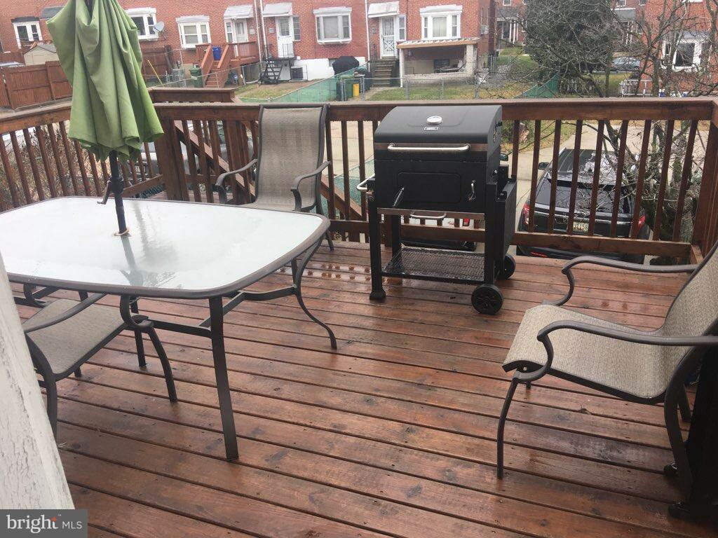 1728 Ingram Road Baltimore, MD 21239 - Photo 42 of 44 a view of a balcony with chairs