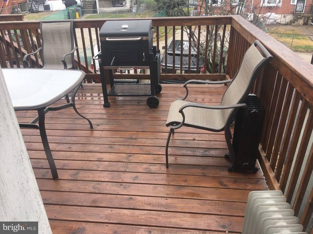 1728 Ingram Road Baltimore, MD 21239 - Photo 44 of 44 a view of a balcony with chairs