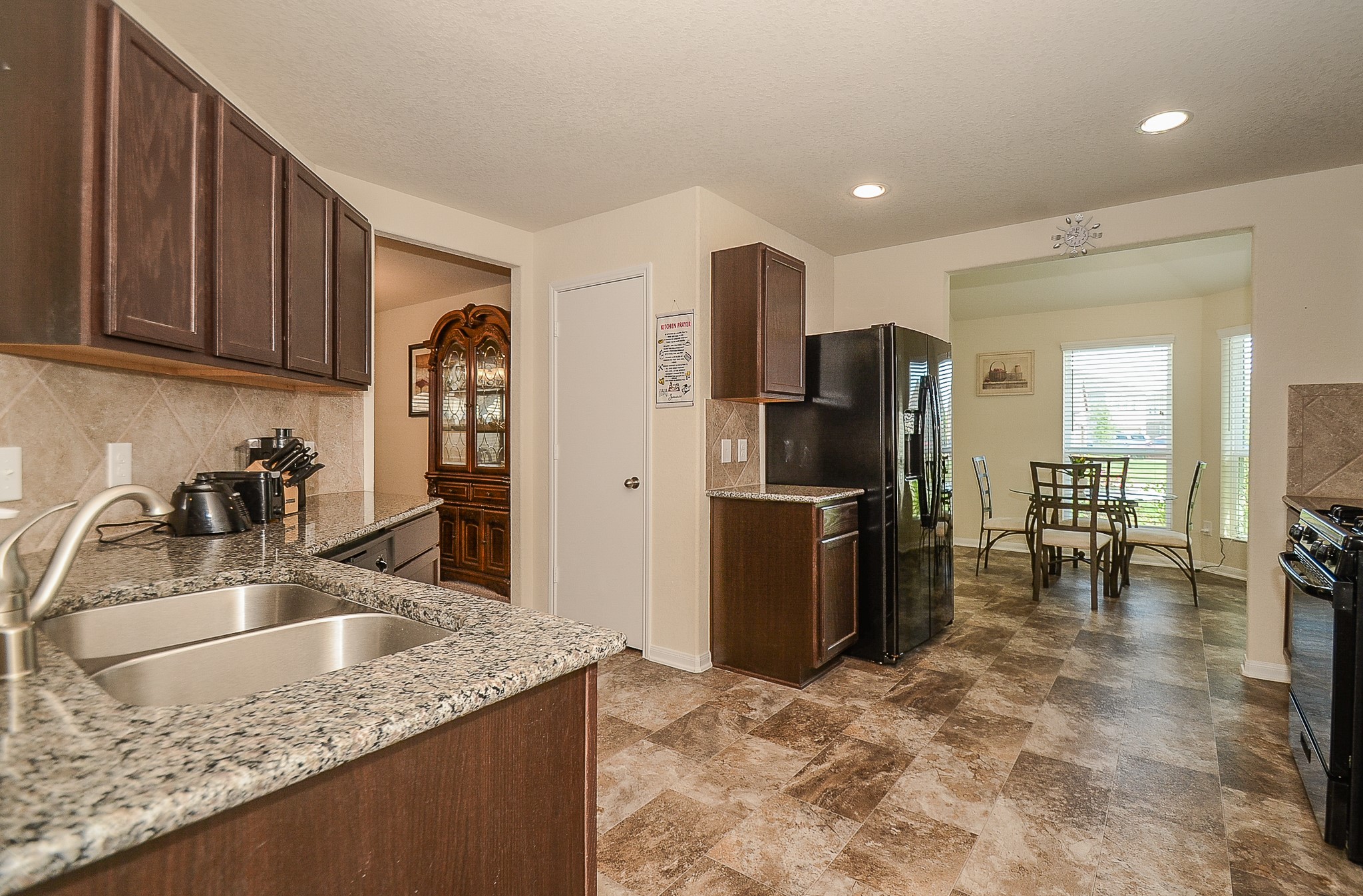 3027 Narrow Stream Way Katy, TX 77493 - Photo 11 of 32 Kitchen with granite countertops