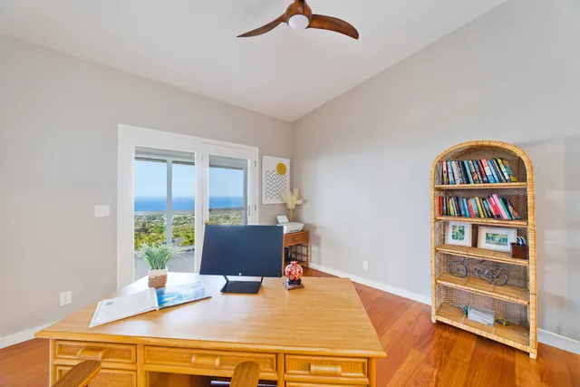a workspace with furniture and window