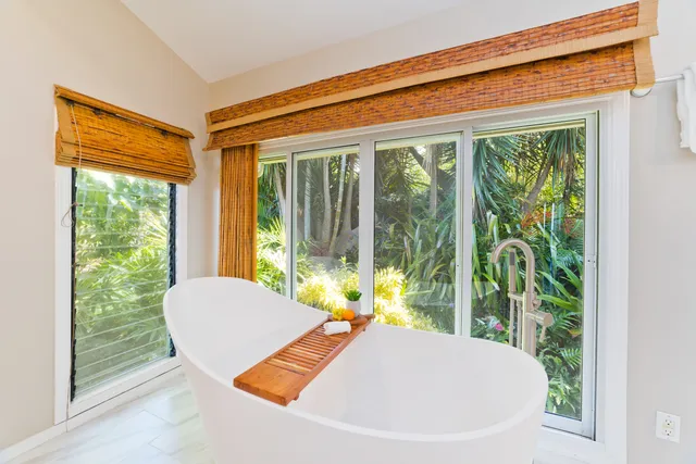 a view of a living room and floor to ceiling window