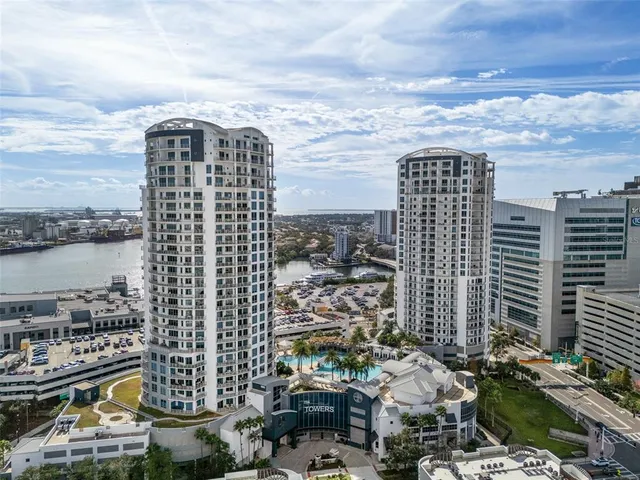 a view of a city with tall buildings