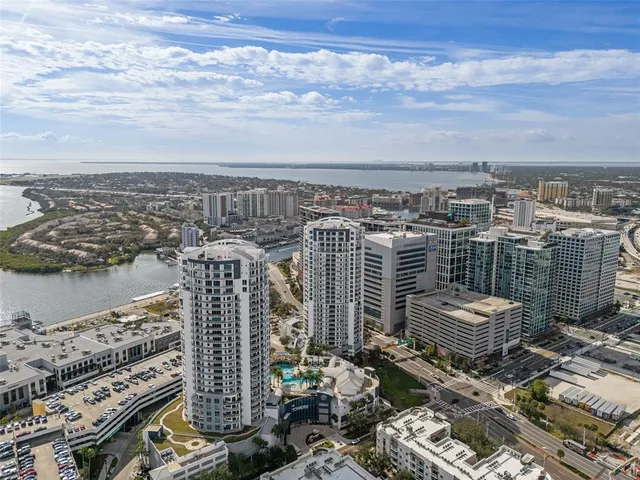 a view of a city and ocean