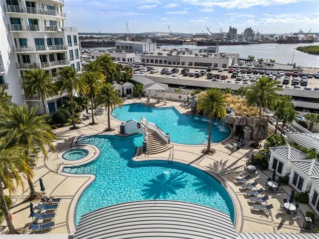 a view of a swimming pool with a patio