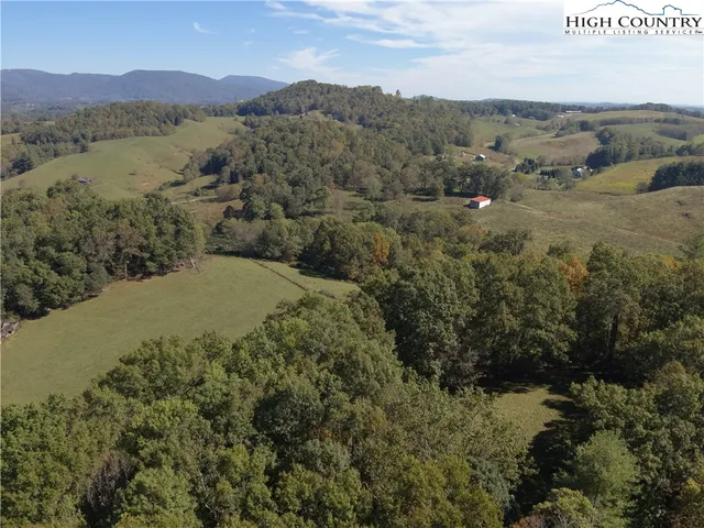 a view of mountain with sunset view