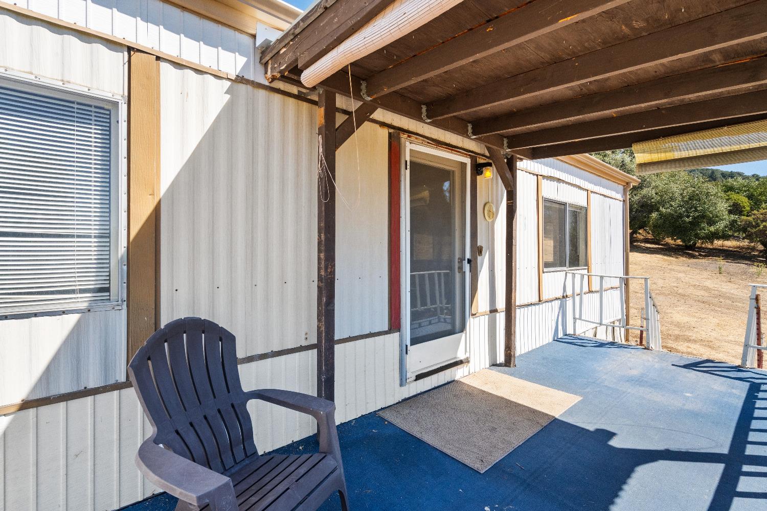40882 Jean Road East Oakhurst, CA 93644 - Photo 18 of 32 a view of a balcony with furniture