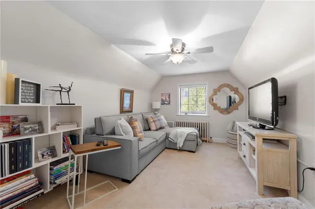 a bedroom with a bed a table and chair