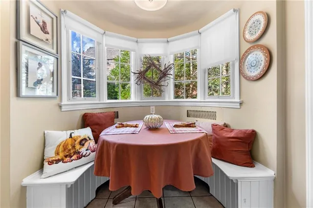 a dining room with a large window