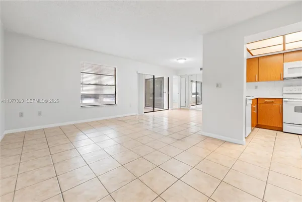 a view of an empty room and window