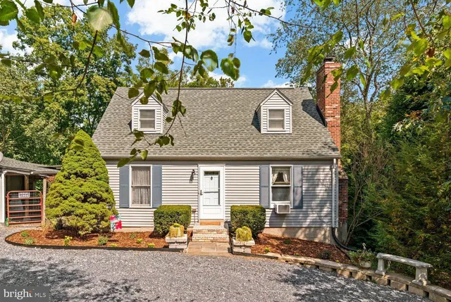 front view of a house with a patio