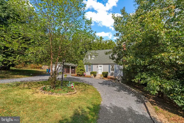 a front view of a house with yard