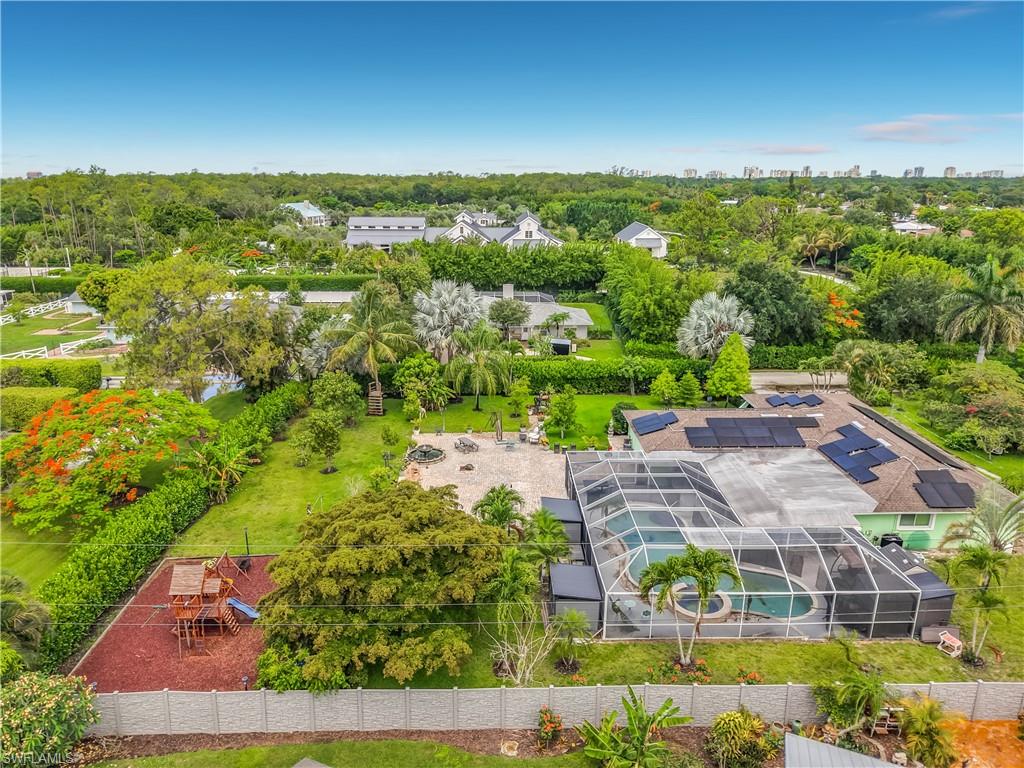 2280 Capri Court Naples, FL 34105 - Photo 27 of 49 an aerial view of residential houses with outdoor space and street view
