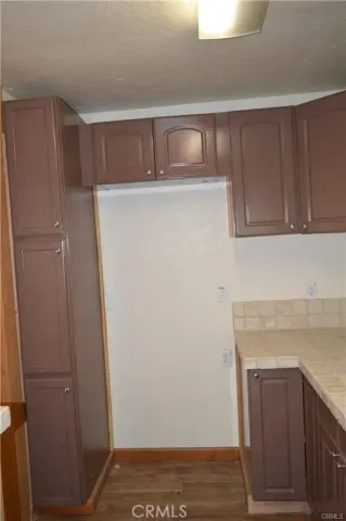 a view of storage and utility room with washer and dryer