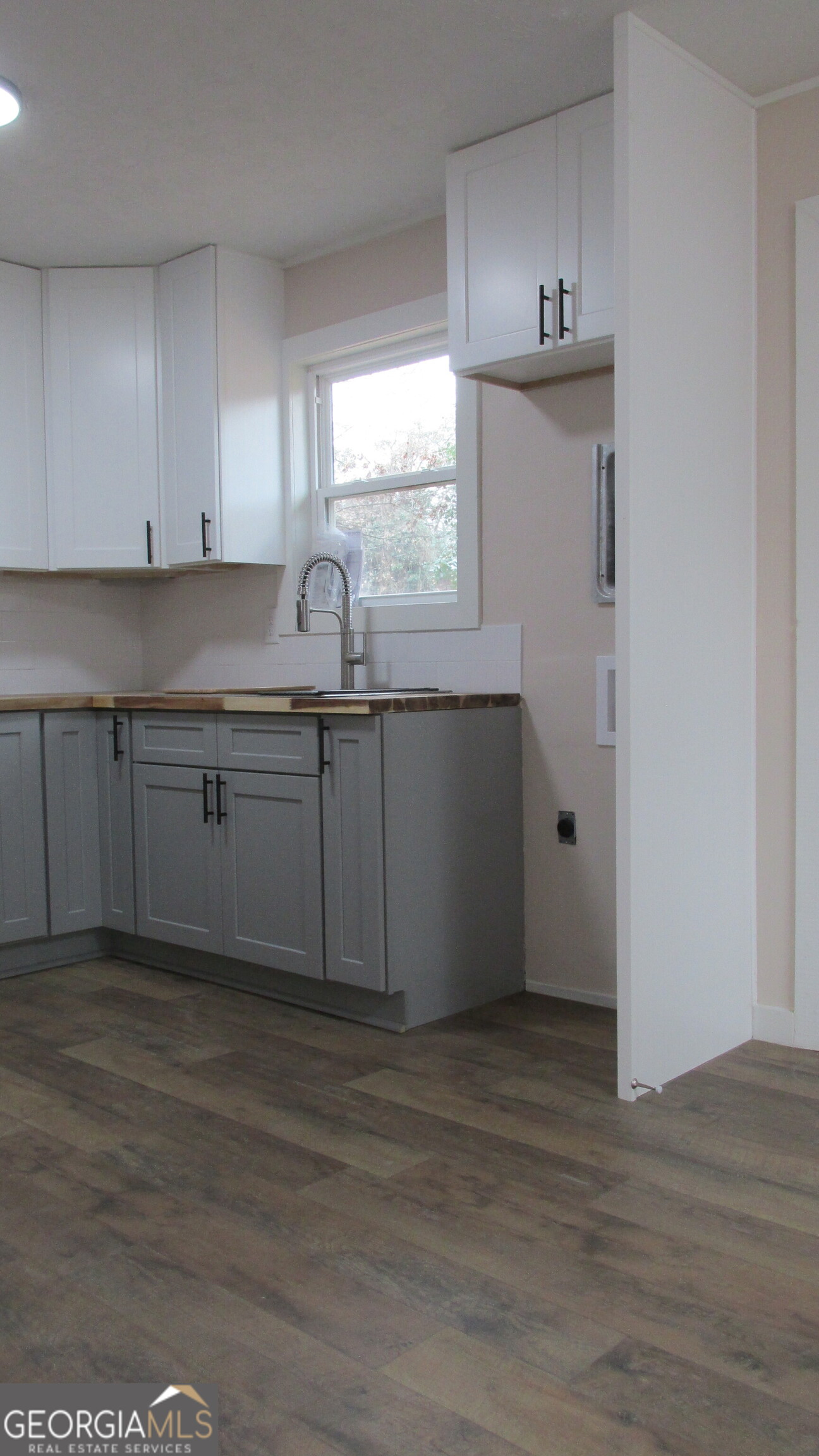 21 Duke Circle Winder, GA 30680 - Photo 18 of 19 a view of kitchen with granite countertop cabinets a sink and dishwasher