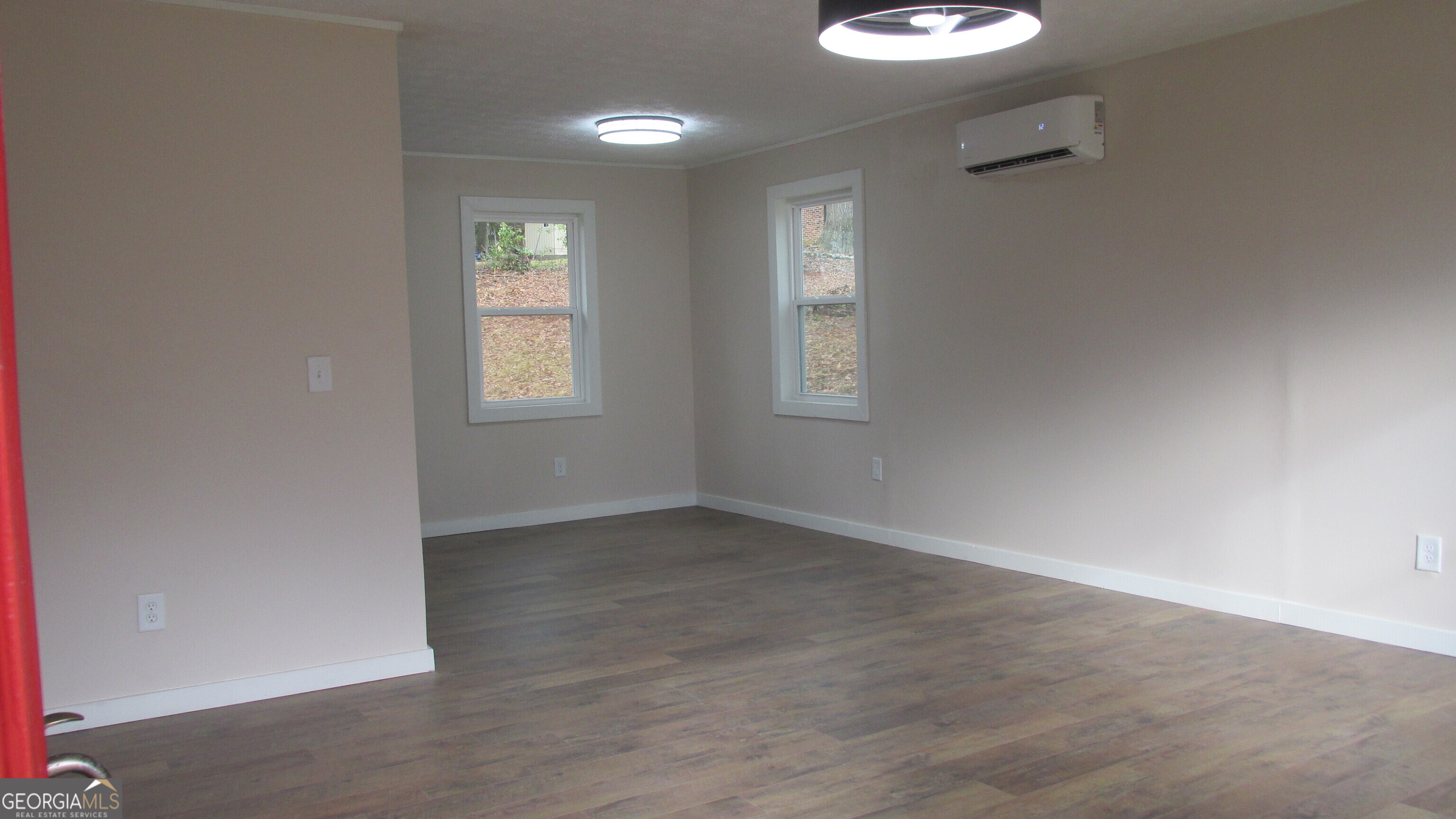 21 Duke Circle Winder, GA 30680 - Photo 19 of 19 an empty room with windows and closet