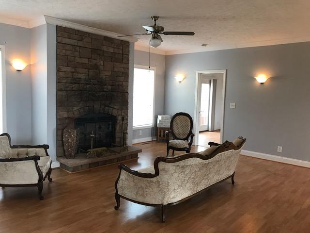 6043 Sandy Ford Road Blue Ridge, VA 24064 - Photo 13 of 44 Living room w/stone fireplace
