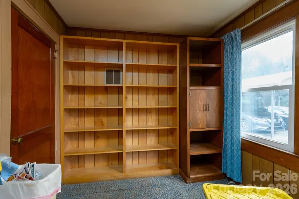 a room with furniture and a window