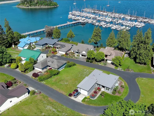 an aerial view of a house with a garden