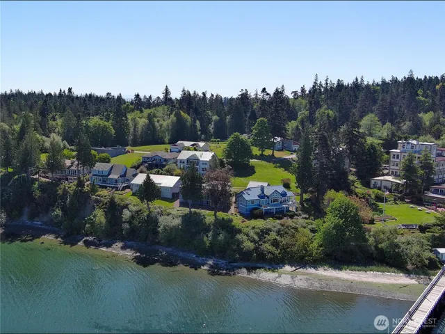 an aerial view of a house with a garden
