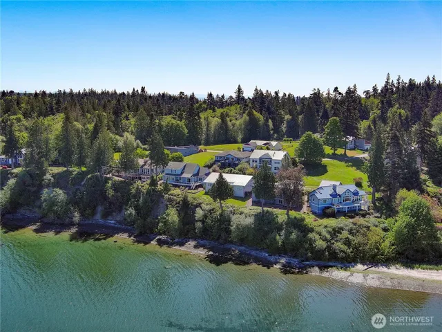 an aerial view of a house with a garden