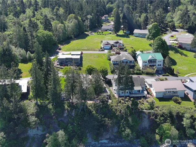 an aerial view of a house with a garden