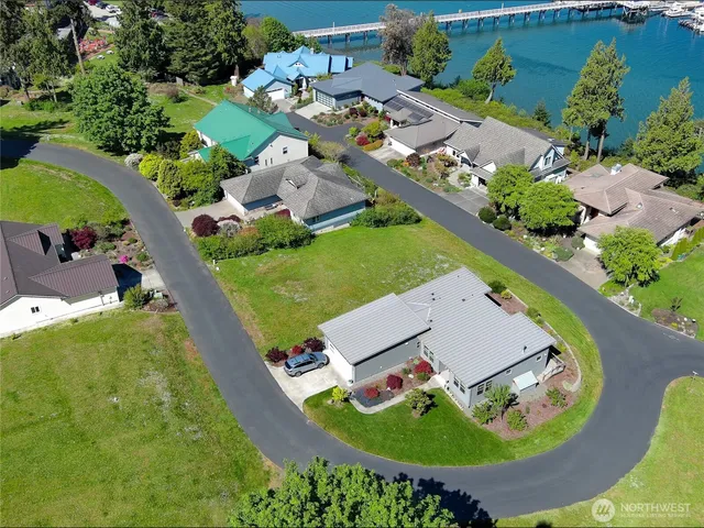 an aerial view of a house with outdoor space