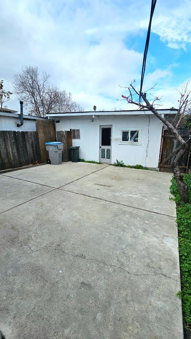 371 East William Street San Jose, CA 95112 - Photo 8 of 9 a front view of a house with a yard