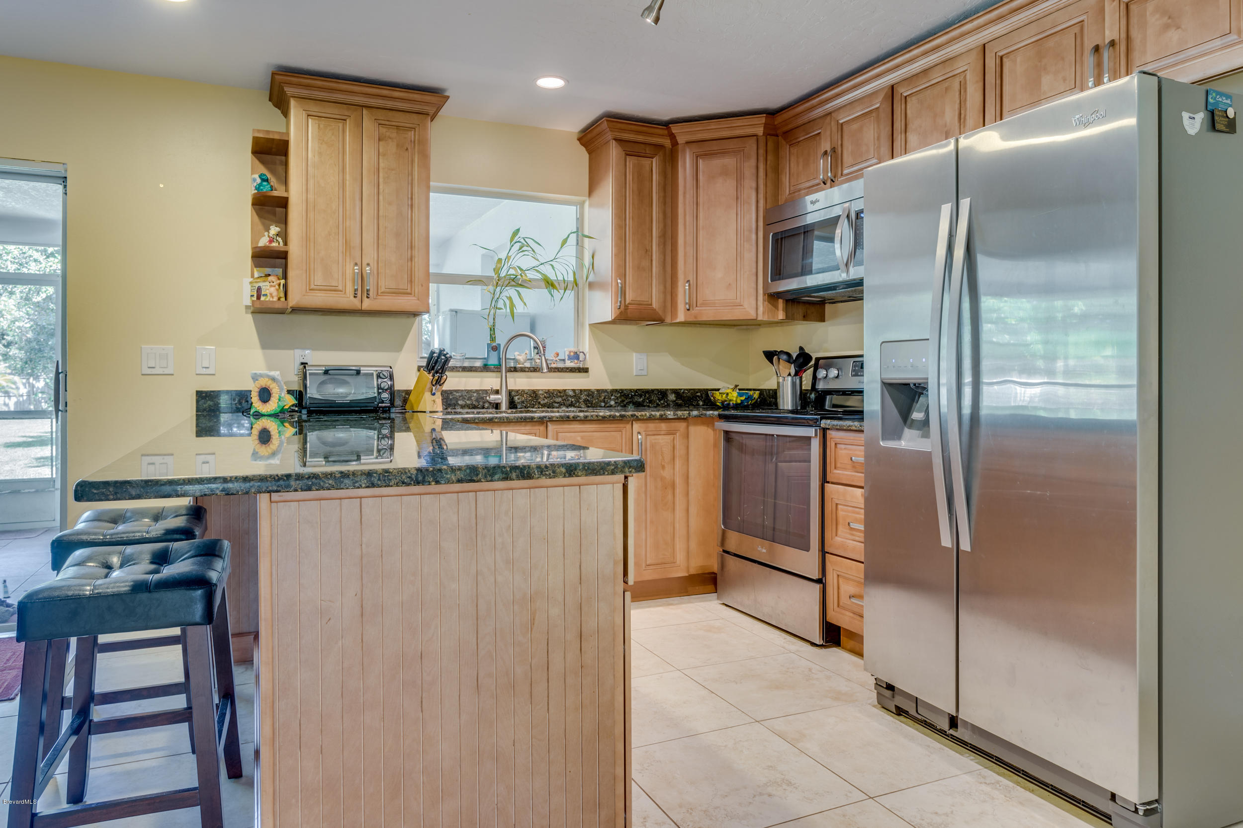 3620 Laurette Road Merritt Island, FL 32952 - Photo 14 of 39 Maple Cabinets