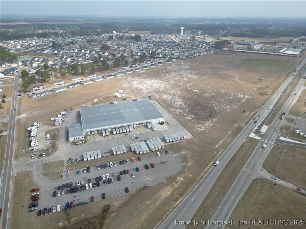 0 Fayetteville Road Raeford, NC 28376 - Photo 4 of 12 an aerial view of a city