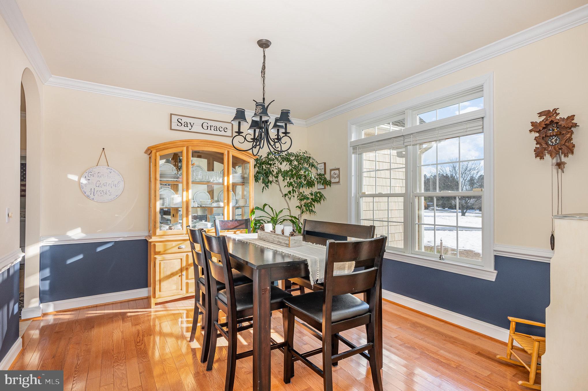 8291 Clearfield Road Denton, MD 21629 - Photo 13 of 40 a view of a dining room with furniture and window