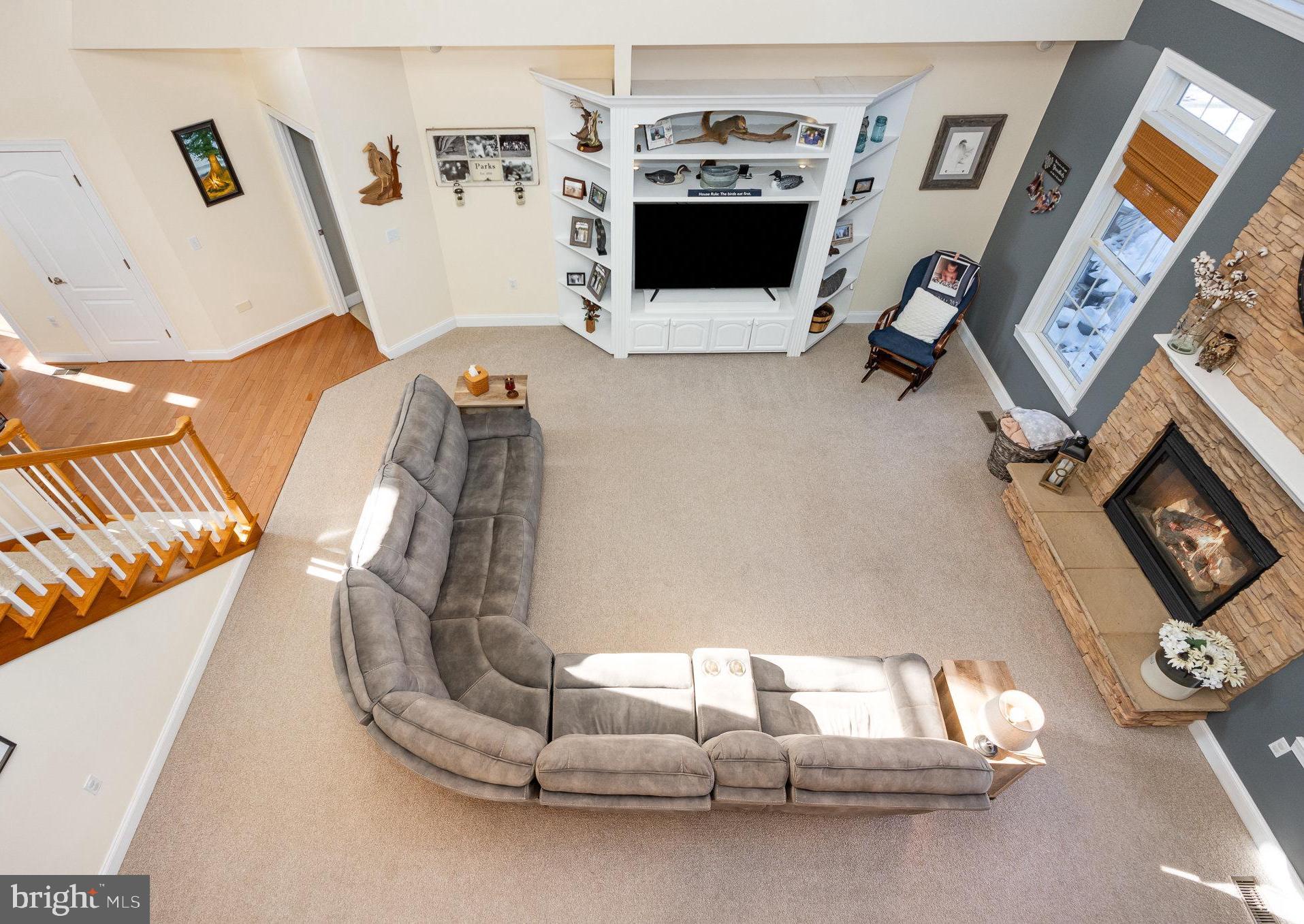 8291 Clearfield Road Denton, MD 21629 - Photo 25 of 40 a view of living room with furniture and flat screen tv