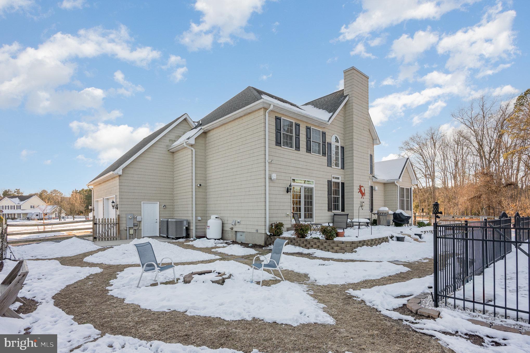 8291 Clearfield Road Denton, MD 21629 - Photo 33 of 40 a view of the house with outdoor space
