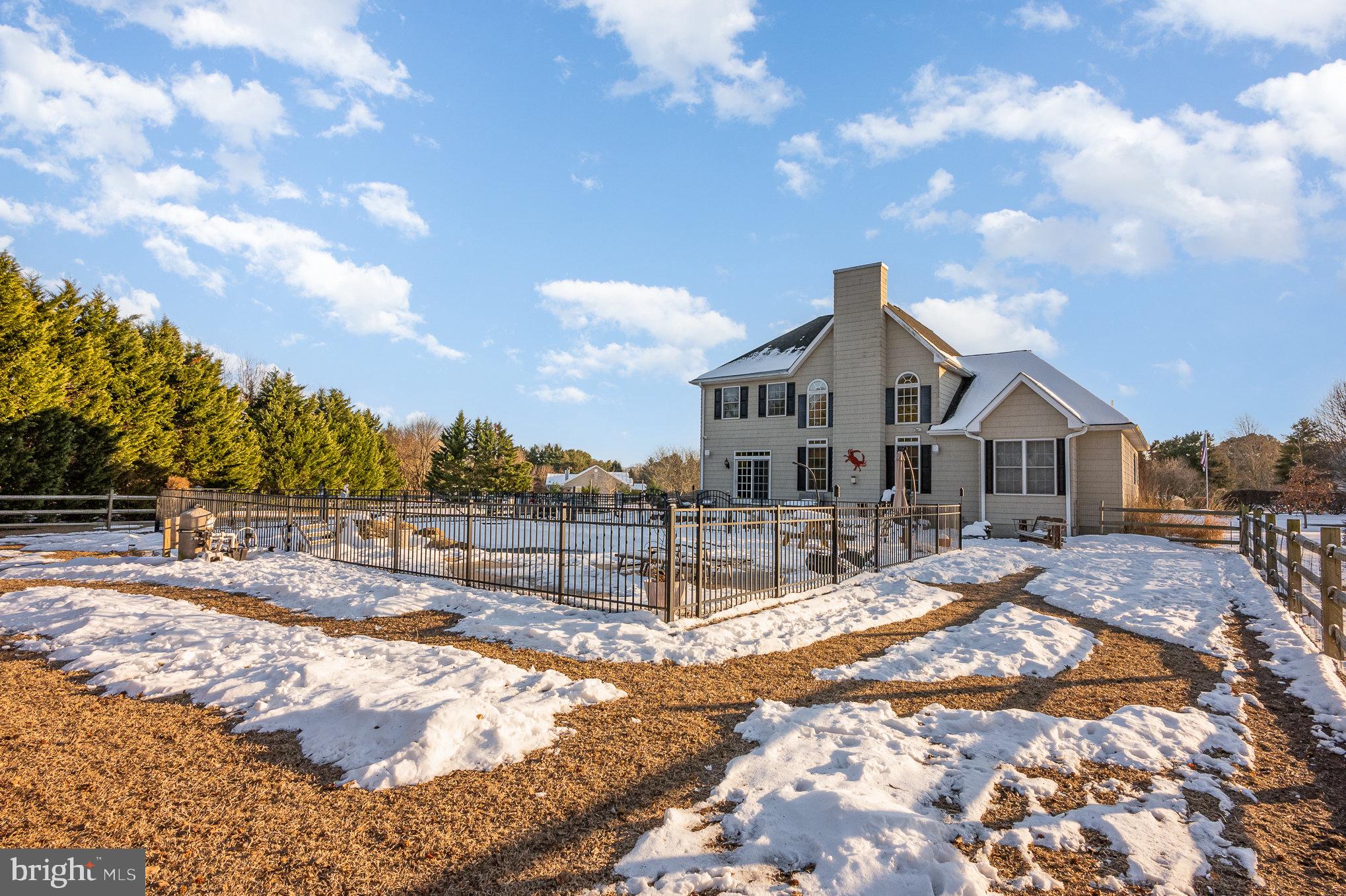 8291 Clearfield Road Denton, MD 21629 - Photo 34 of 40 a view of house with yard and sitting area