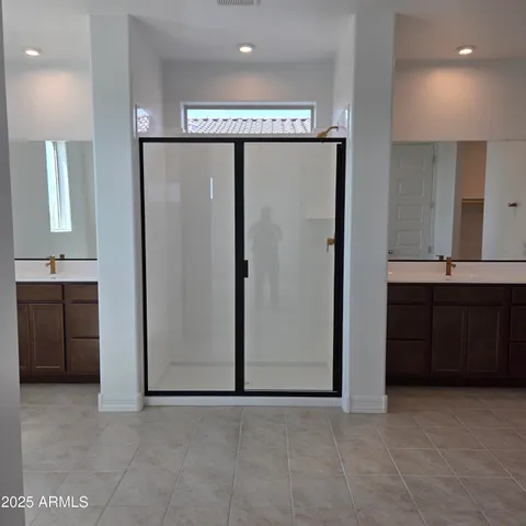 a view of a refrigerator in kitchen