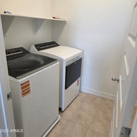 a building with a table and a chandelier