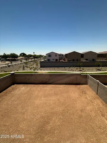 a view of a house with a street