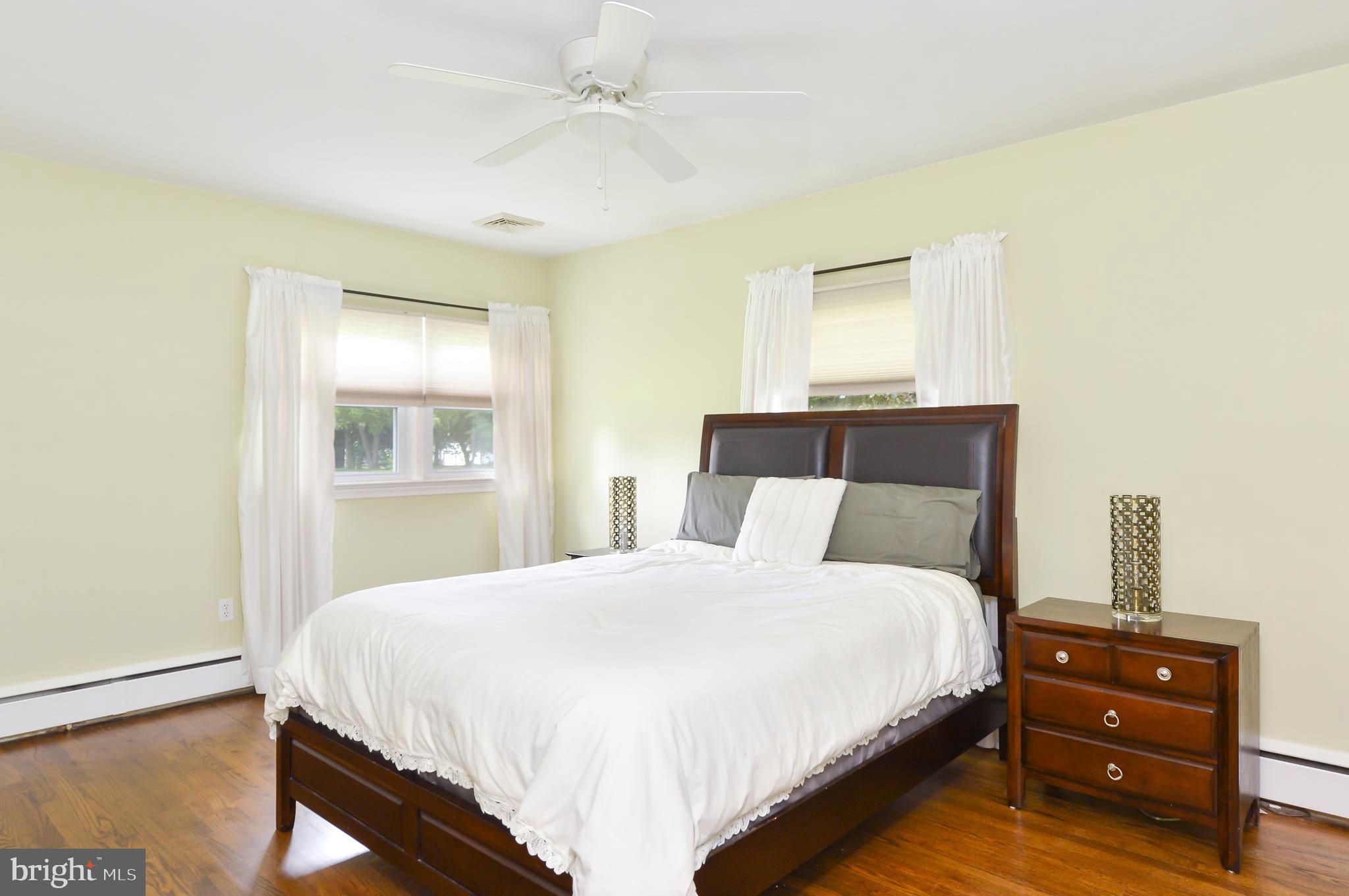 202 Friendship Road Elkton, MD 21921 - Photo 17 of 23 Third bedroom with corner windows and ceiling fan