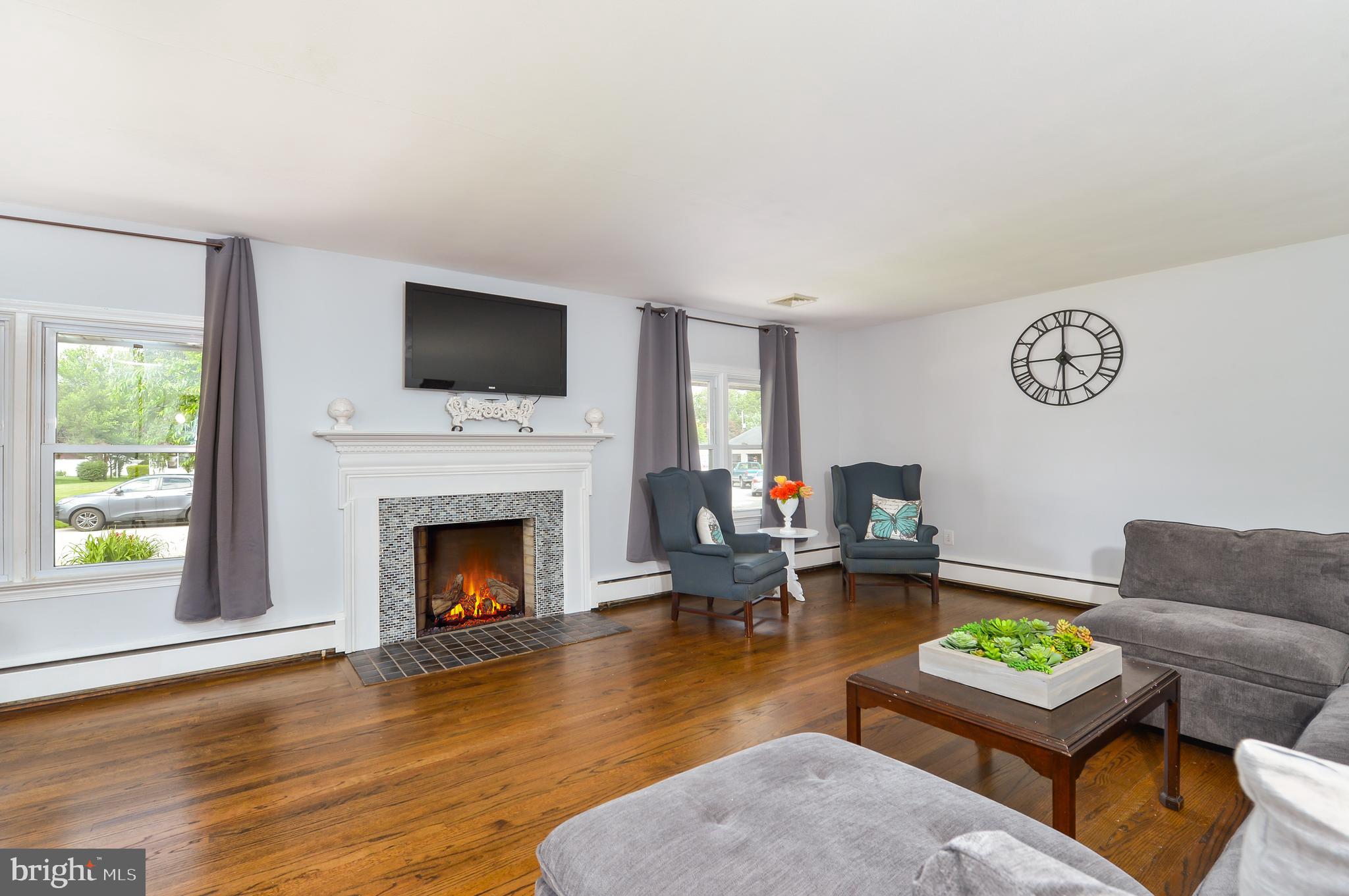 202 Friendship Road Elkton, MD 21921 - Photo 5 of 23 Family room with cozy fireplace