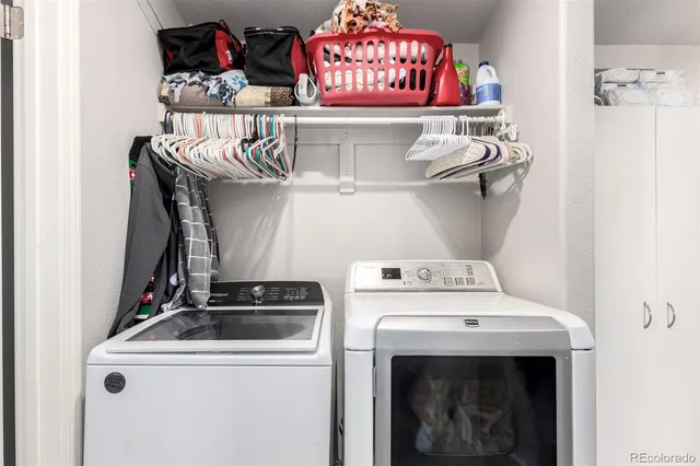 a utility room with dryer and washer