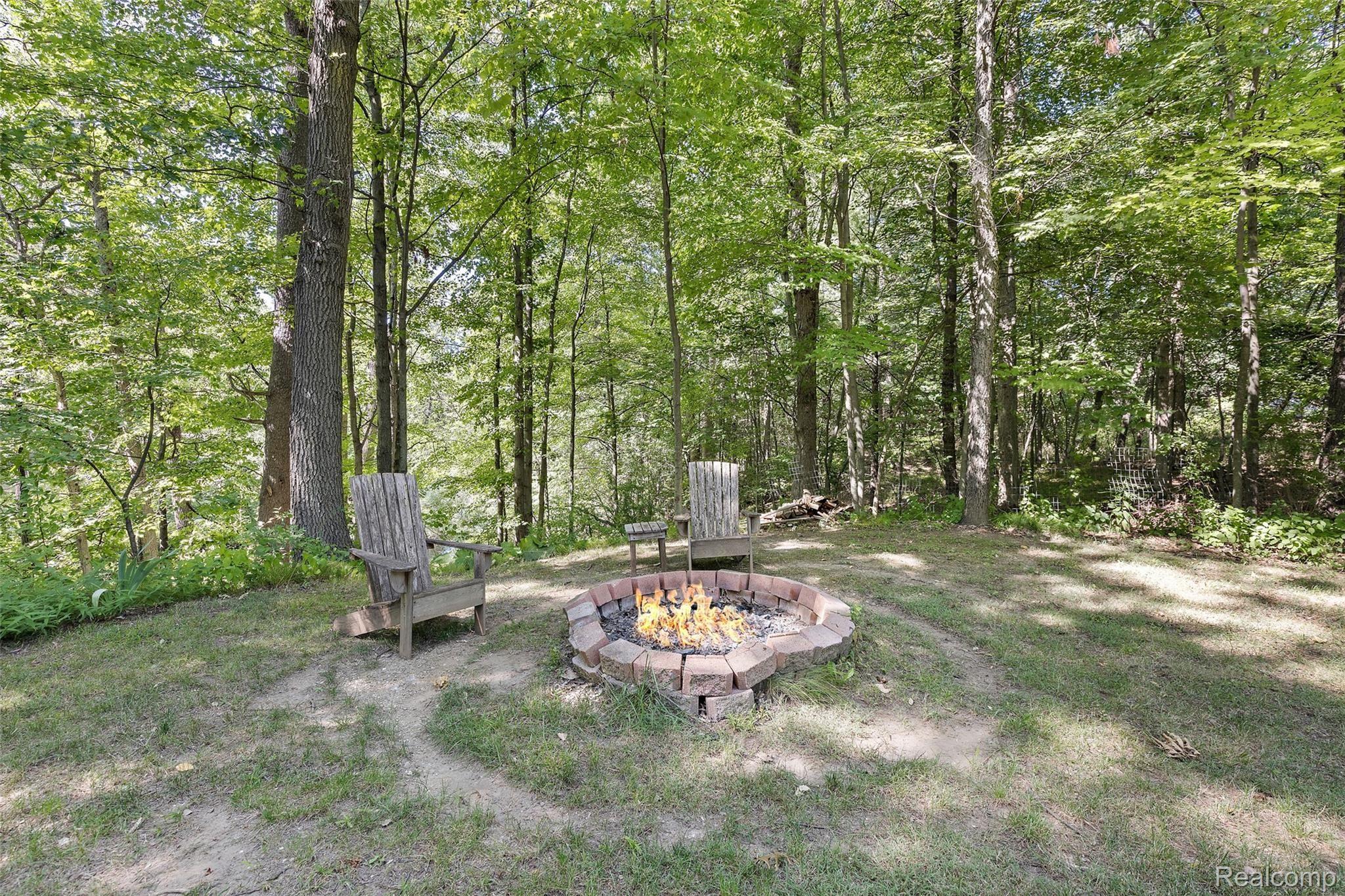 199 Ridgemont Road Oxford, MI 48370 - Photo 59 of 77 Large level yard with fire pit