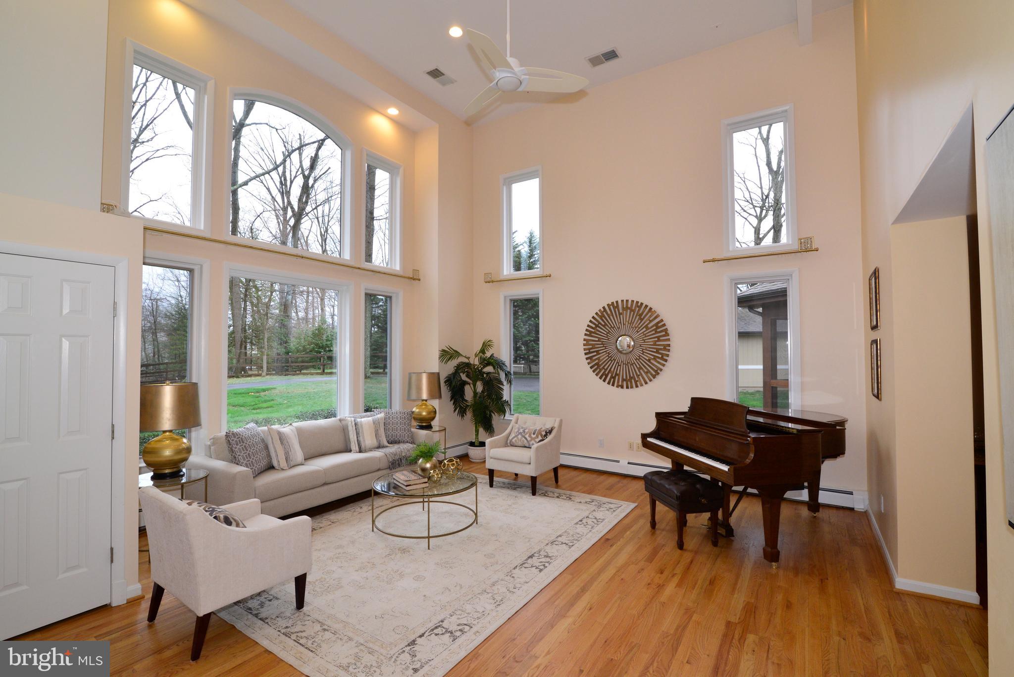 9600 Clarks Crossing Road Vienna, VA 22182 - Photo 2 of 79 View of beautiful living room w/ wall of windows!