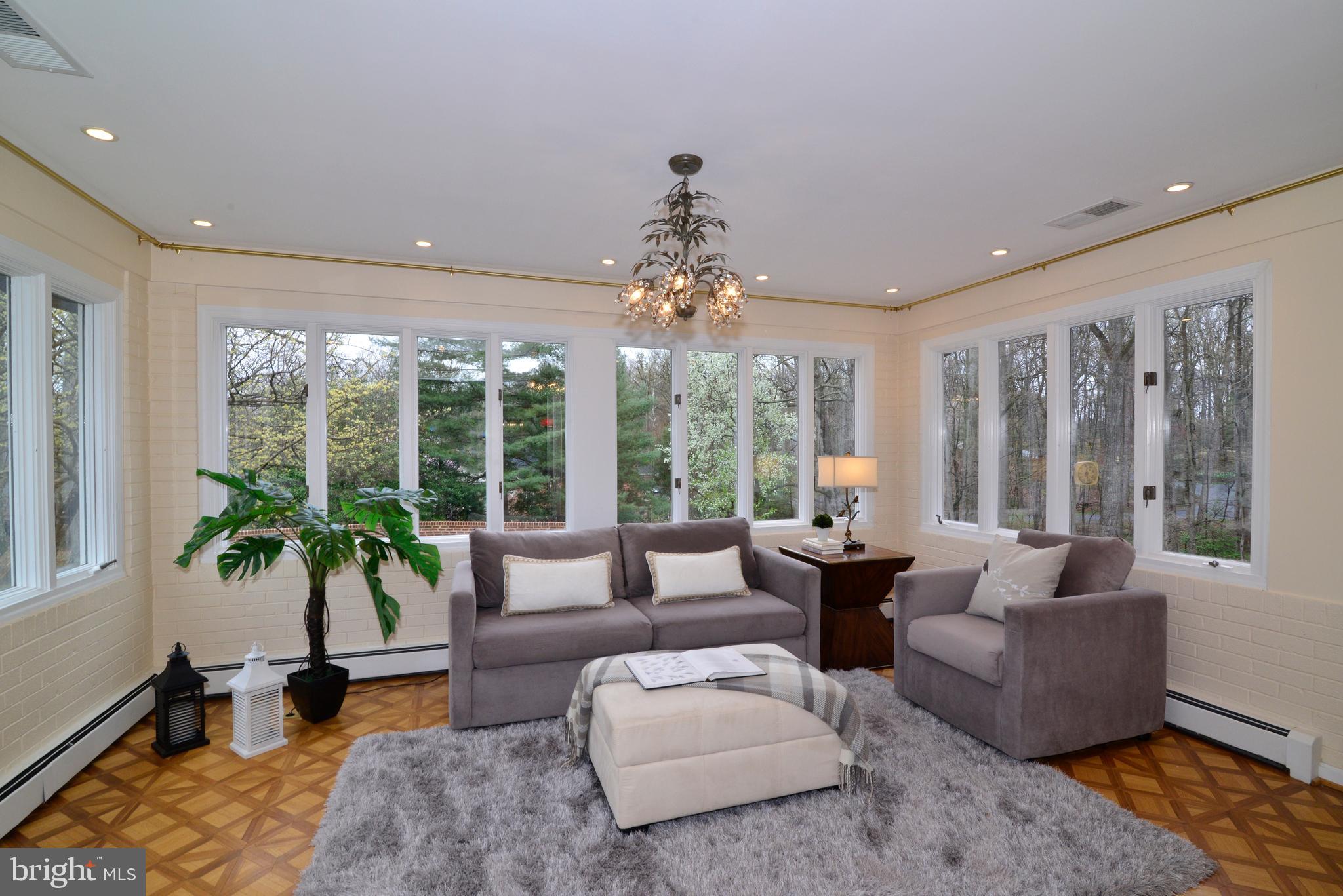 9600 Clarks Crossing Road Vienna, VA 22182 - Photo 18 of 79 Sunroom off kitchen with view of backyard retreat