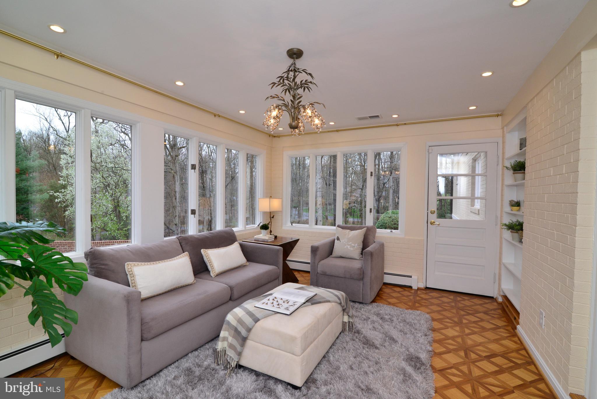 9600 Clarks Crossing Road Vienna, VA 22182 - Photo 19 of 79 Sunroom with so many windows and light!