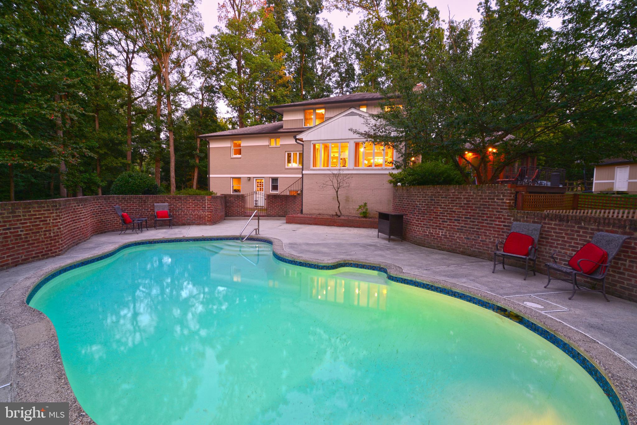 9600 Clarks Crossing Road Vienna, VA 22182 - Photo 51 of 79 Pool/Patio enclosed by brick wall for privacy