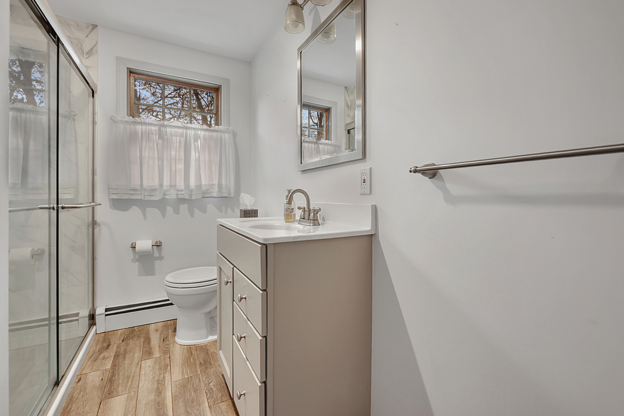 15 Jan Road Bristol, CT 06010 - Photo 13 of 27 a bathroom with a toilet sink and a mirror