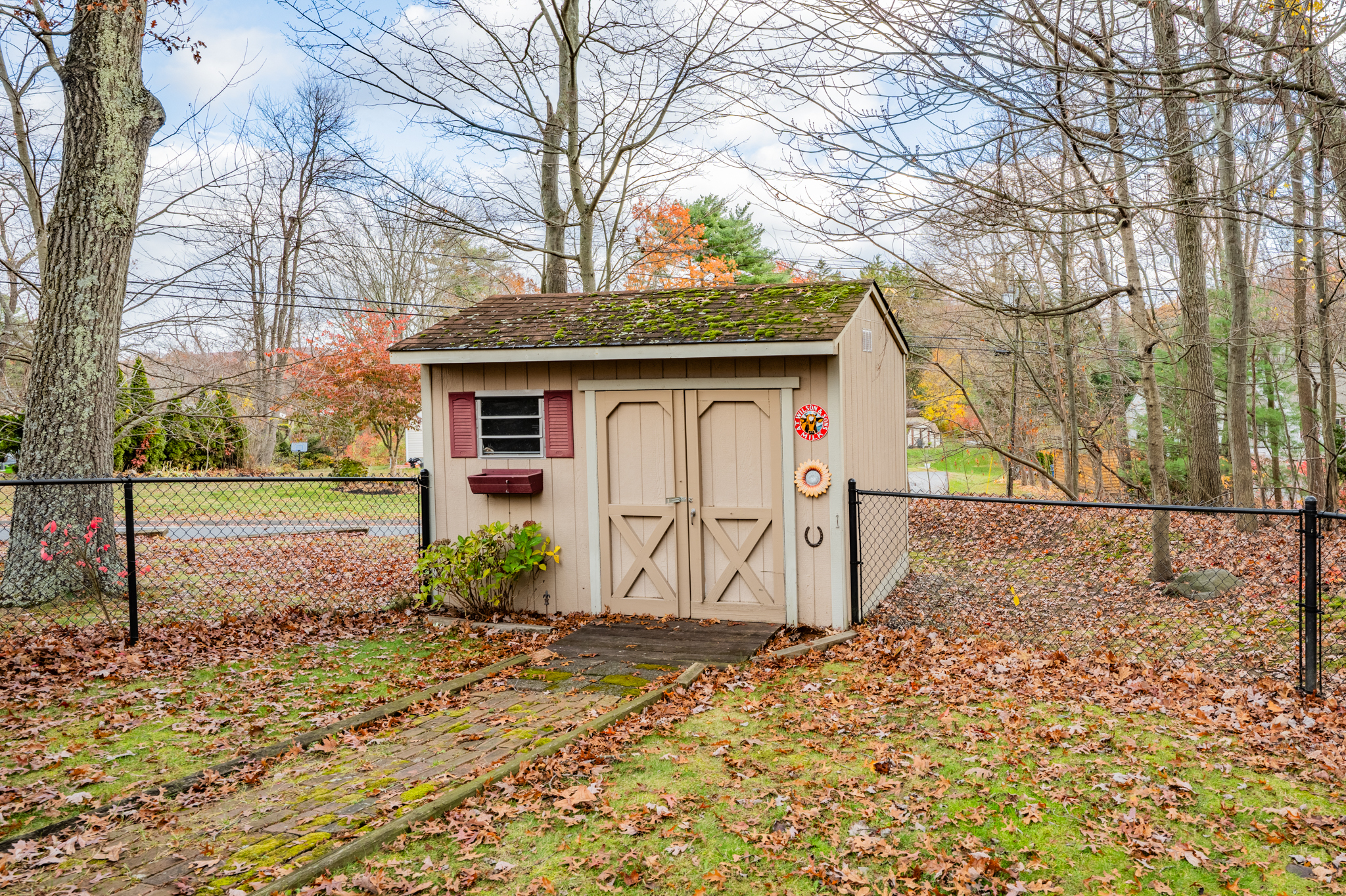 15 Jan Road Bristol, CT 06010 - Photo 25 of 27 a view of a house with backyard and trees