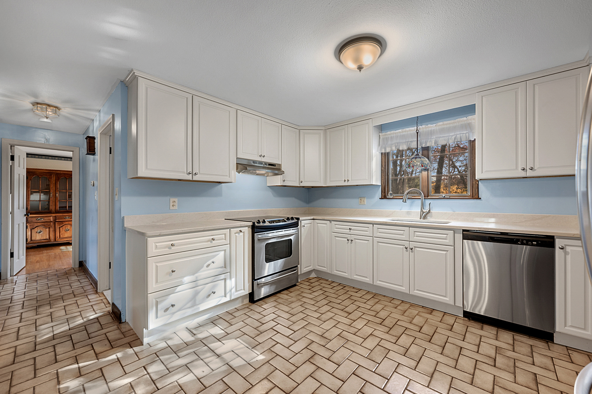 15 Jan Road Bristol, CT 06010 - Photo 4 of 27 a kitchen with cabinets and appliances