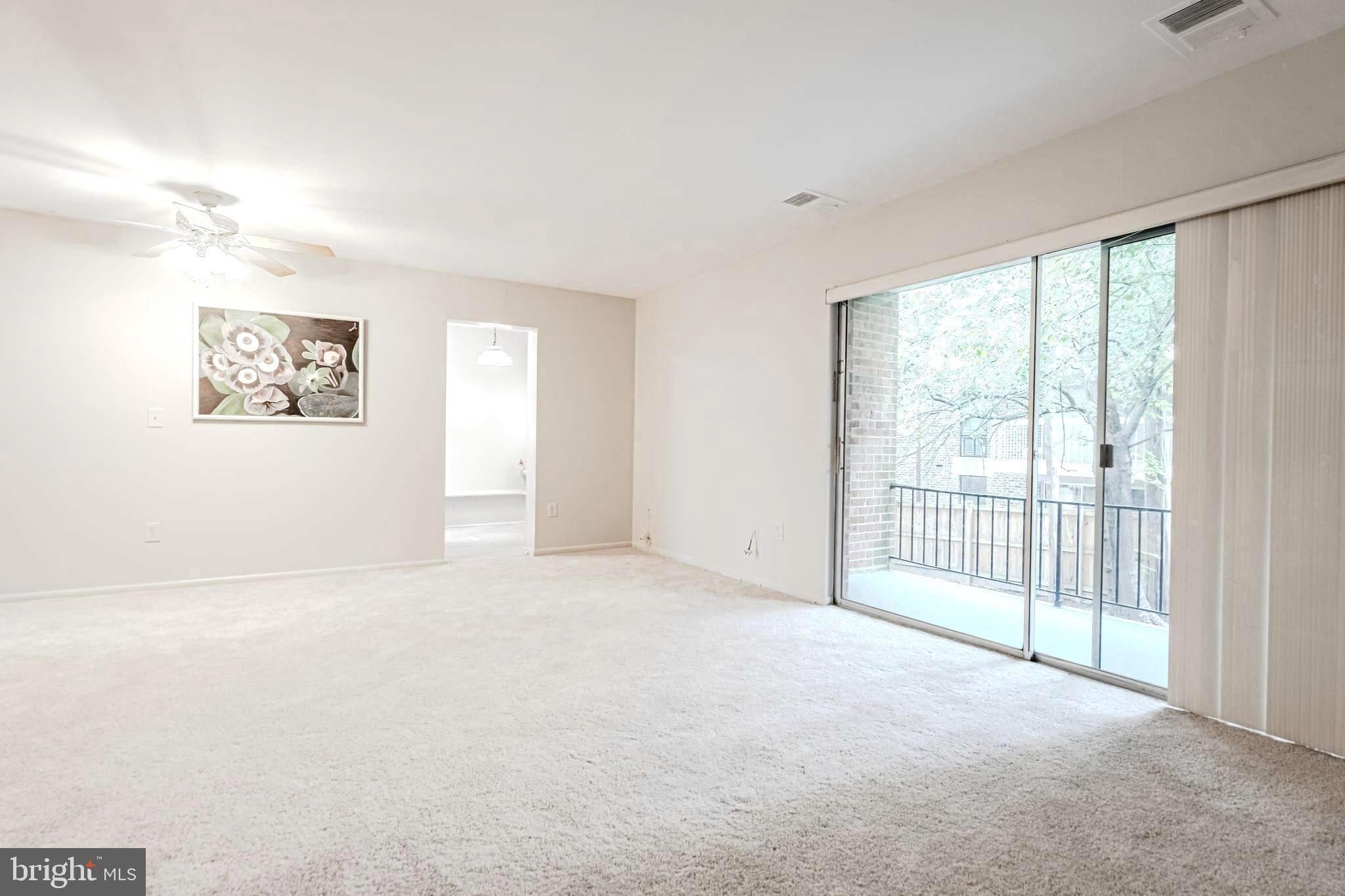 3356 Hewitt Avenue, Unit 201 Silver Spring, MD 20906 - Photo 10 of 25 Living Room/Dining Rppm