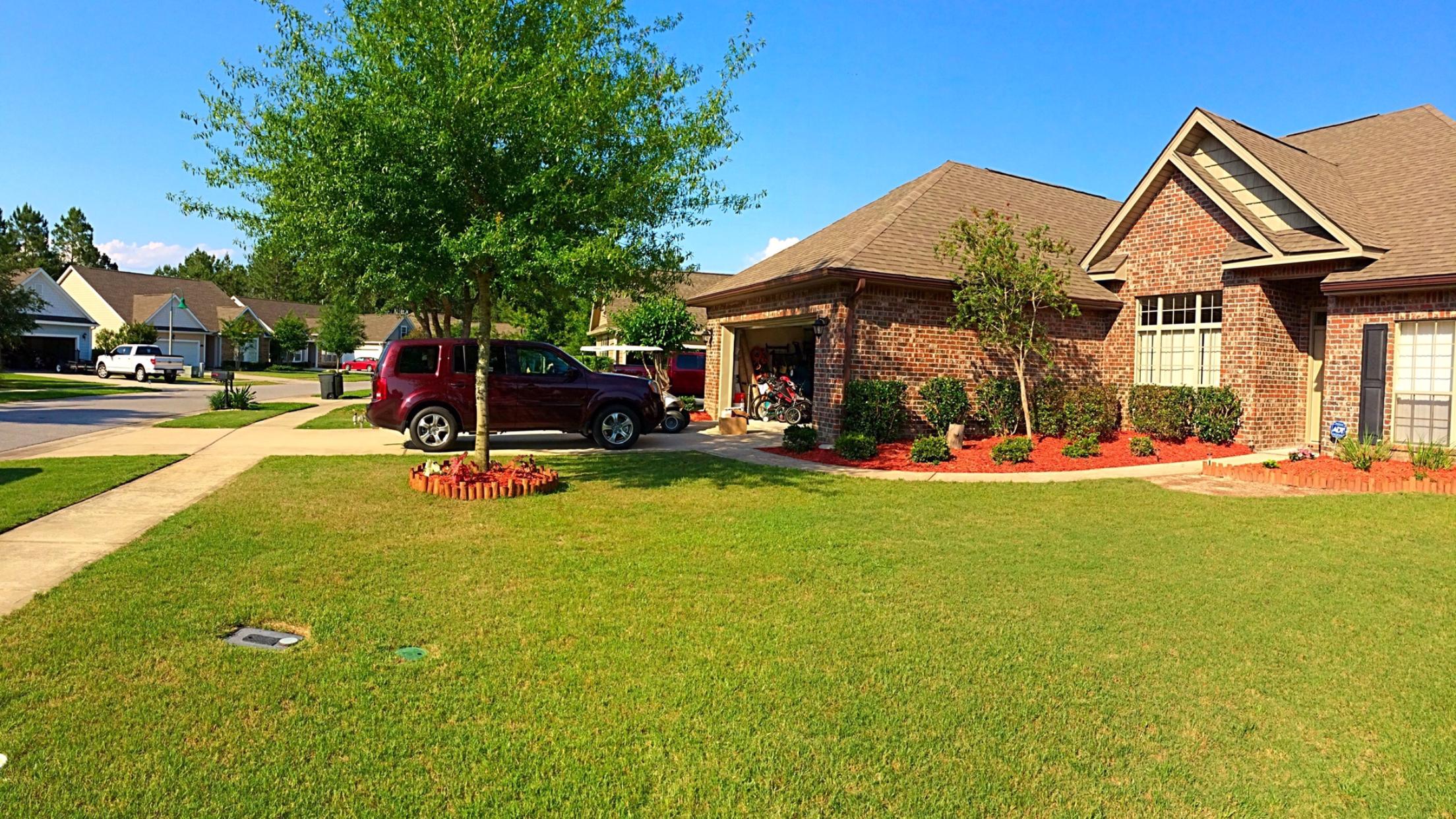 38 Concert Court Freeport, FL 32439 - Photo 3 of 7 NICELY MANICURED LANDSCAPING
