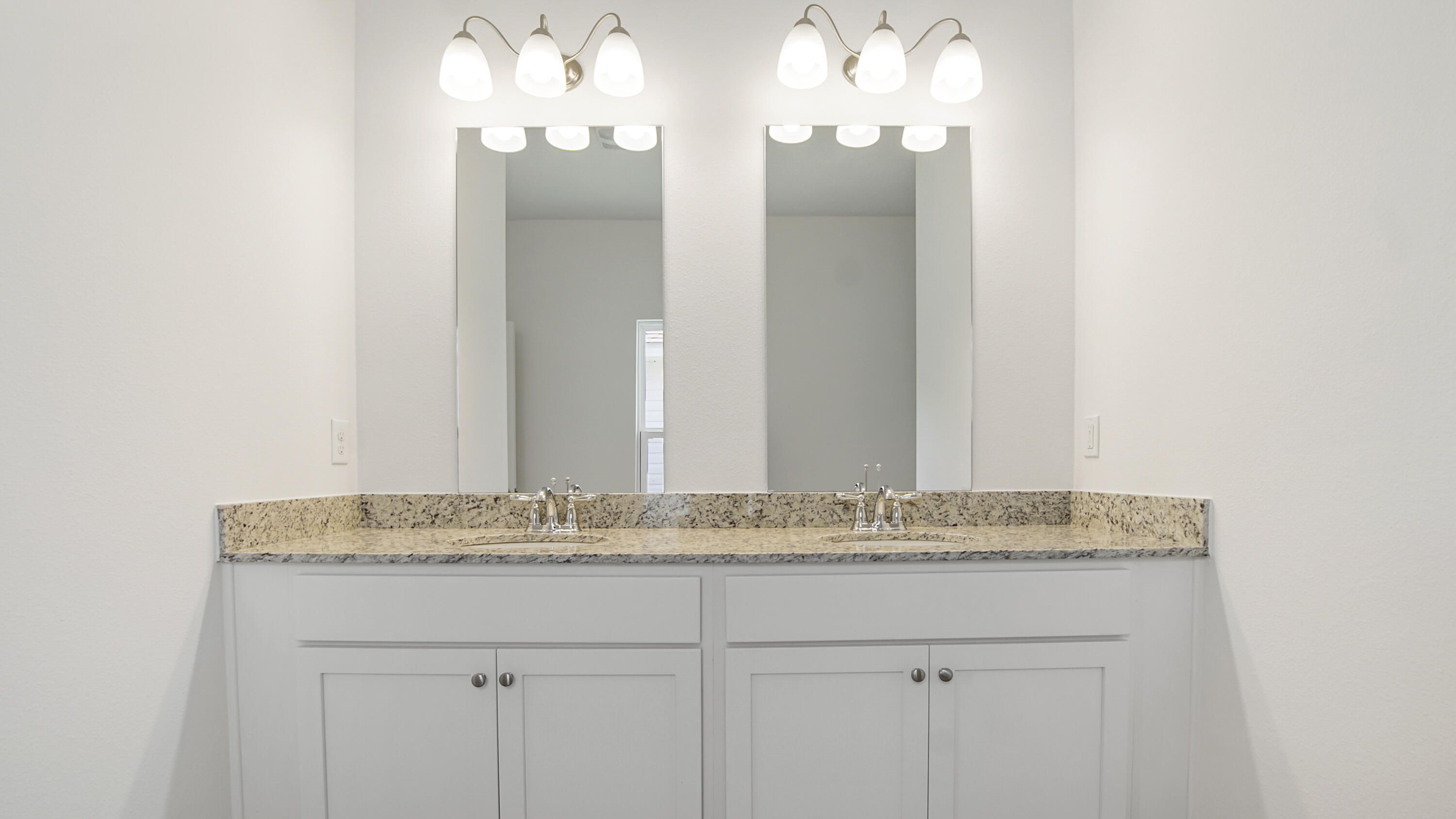 206 Huckleberry Street Freeport, FL 32439 - Photo 22 of 36 a bathroom with a granite countertop sink and a mirror